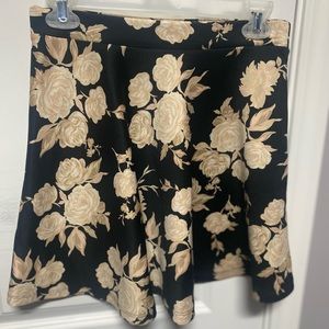 Black skater skirt with floral pattern